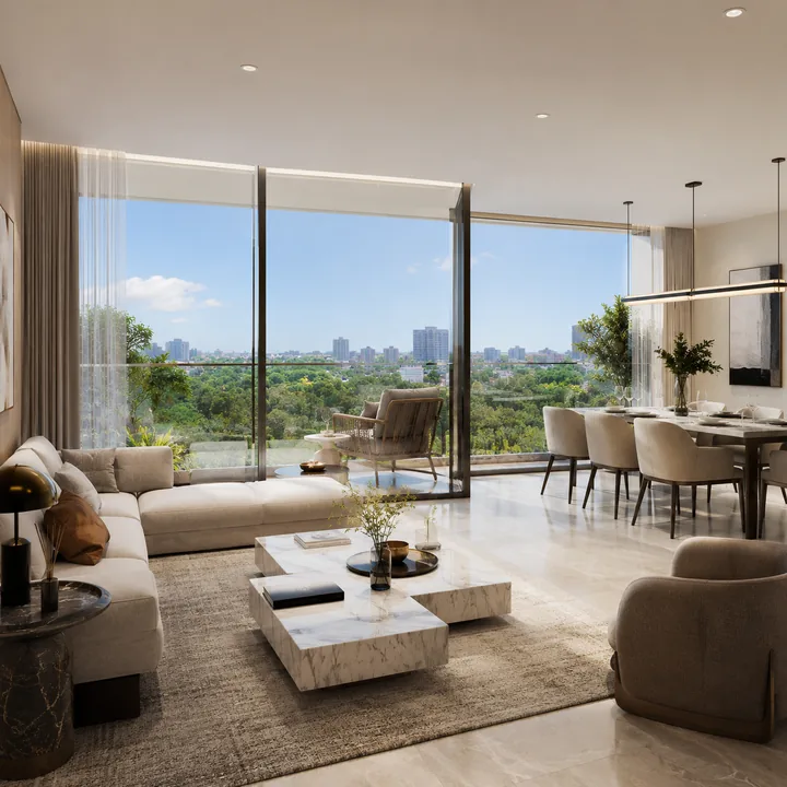 Mahindra Navrat Sadahalli apartment interior - living and dining volume opening onto a balcony with a treetop outlook Mahindra Navrat Sadahalli apartment interior - living and dining volume opening onto a balcony with a treetop outlook